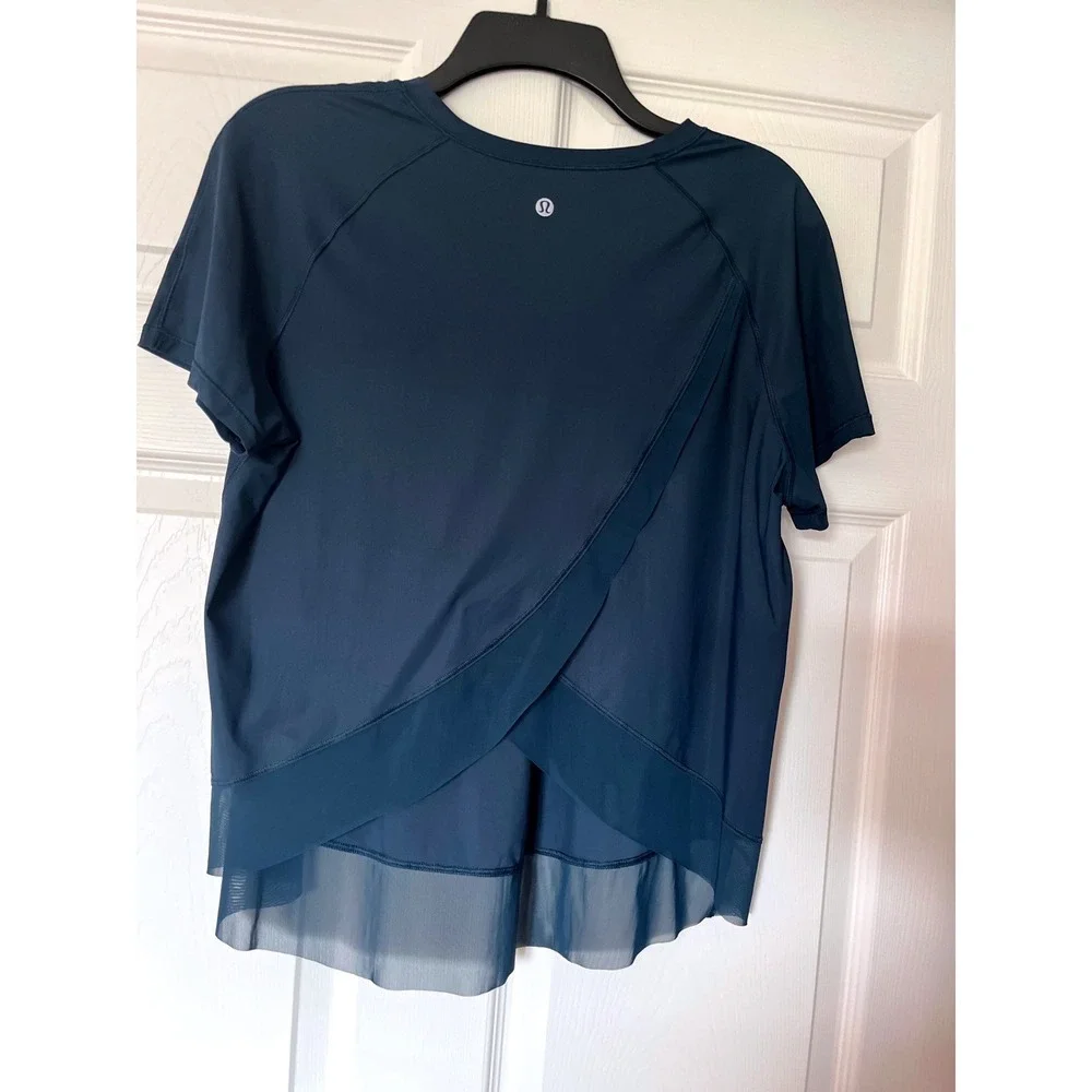 Lululemon Teal Short Sleeve Mesh Hem Crossover Tulip Back Activewear Top Womens